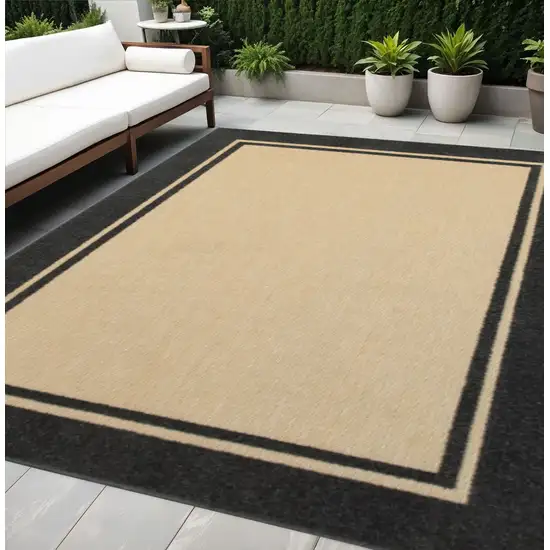 Beige And Black Indoor Outdoor Area Rug Photo 1