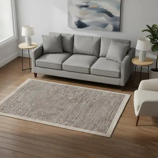 Sand And Gray Distressed Border Area Rug Photo 1