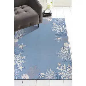 Photo of Sea Blue Hand Hooked Bordered Coral Reef Indoor Accent Rug