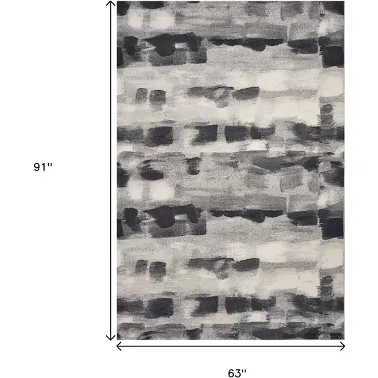 Gray Black And Ivory Abstract Area Rug Photo 3