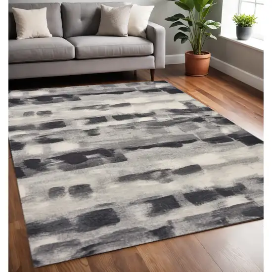Gray Black And Ivory Abstract Area Rug Photo 1