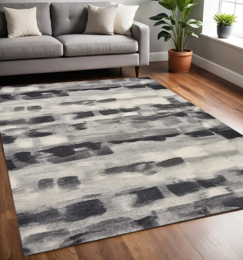 Gray Black And Ivory Abstract Area Rug Photo 1