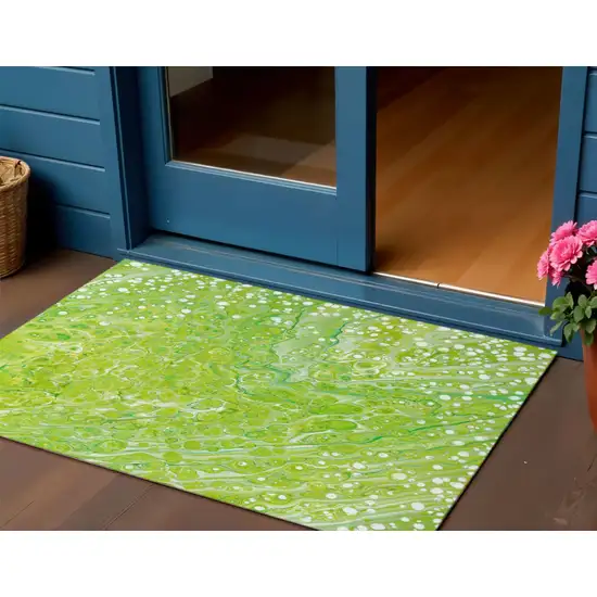 Shamrock Green And Ivory Abstract Washable Indoor Outdoor Area Rug Photo 1