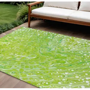Photo of Shamrock Green And Ivory Abstract Washable Indoor Outdoor Area Rug