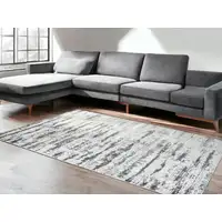 Photo of Silver Abstract Washable Non Skid Area Rug With Fringe