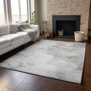 Photo of Silver And Gray Abstract Washable Area Rug With UV Protection