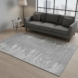 Photo of Silver And Gray Abstract Washable Area Rug With UV Protection