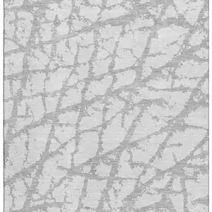 Photo of Silver And Gray Abstract Washable Area Rug With UV Protection