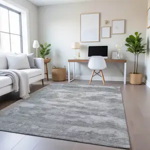 Photo of Silver And Gray Abstract Washable Area Rug With UV Protection