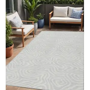 Photo of Silver And Gray Abstract Washable Indoor Outdoor Area Rug