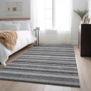 Photo of Silver And Gray Striped Washable Area Rug With UV Protection