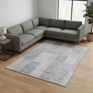 Photo of Silver And Gray Striped Washable Area Rug With UV Protection