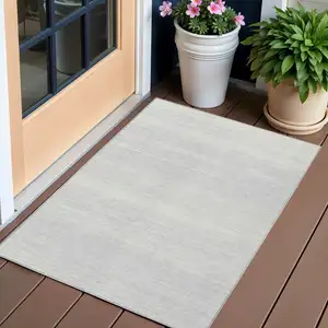 Photo of Silver And Gray Striped Washable Indoor Outdoor Area Rug
