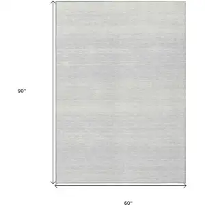 Photo of Silver And Gray Striped Washable Indoor Outdoor Area Rug