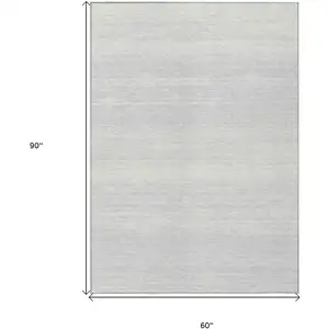 Photo of Silver And Gray Striped Washable Indoor Outdoor Area Rug