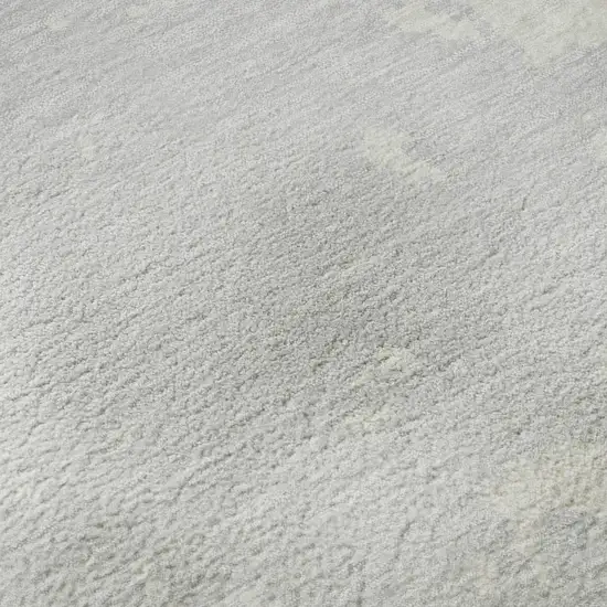 Silver And Ivory Abstract Washable Area Rug With UV Protection Photo 1