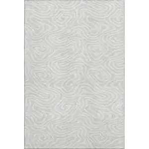 Photo of Silver And Ivory Abstract Washable Area Rug With UV Protection