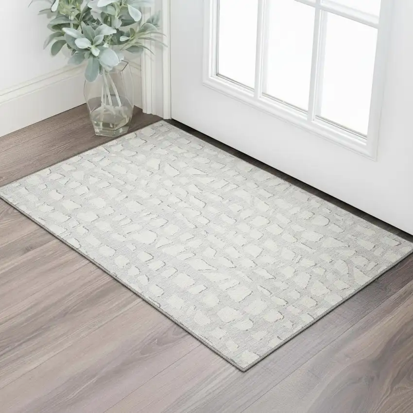 Silver And Ivory Cobblestone Washable Area Rug With UV Protection Photo 1
