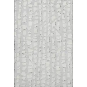 Photo of Silver And Ivory Cobblestone Washable Area Rug With UV Protection