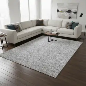 Photo of Silver And Ivory Floral Washable Area Rug With UV Protection