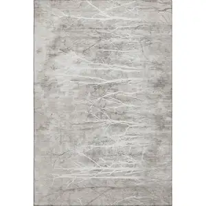 Photo of Silver And Ivory Floral Washable Area Rug With UV Protection