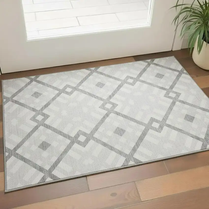 Silver And Ivory Geometric Washable Area Rug With UV Protection Photo 1