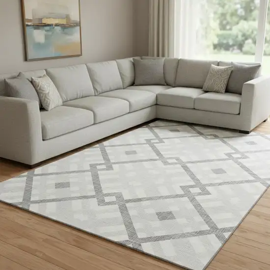 Silver And Ivory Geometric Washable Area Rug With UV Protection Photo 1