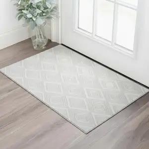 Photo of Silver And Ivory Geometric Washable Area Rug With UV Protection