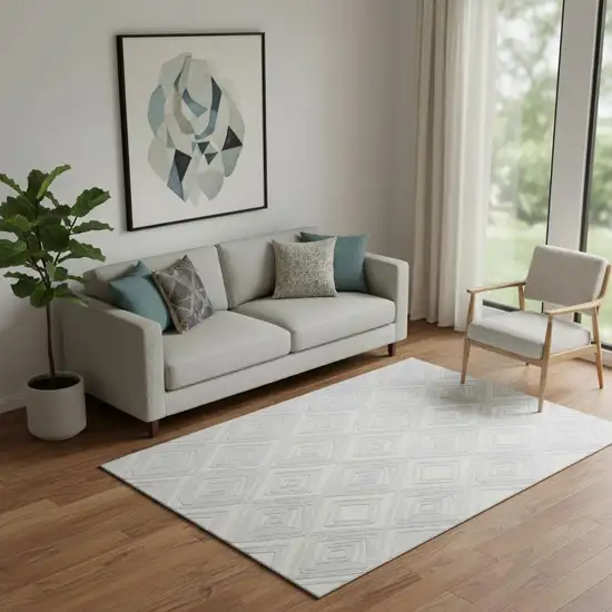 Silver And Ivory Geometric Washable Area Rug With UV Protection Photo 1