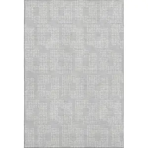 Photo of Silver And Ivory Geometric Washable Area Rug With UV Protection