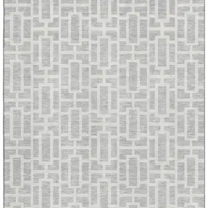 Photo of Silver And Ivory Geometric Washable Area Rug With UV Protection