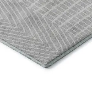 Photo of Silver And Ivory Geometric Washable Area Rug With UV Protection