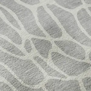 Photo of Silver And Ivory Geometric Washable Area Rug With UV Protection