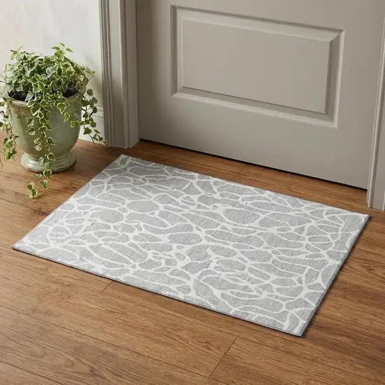 Silver And Ivory Geometric Washable Area Rug With UV Protection Photo 1