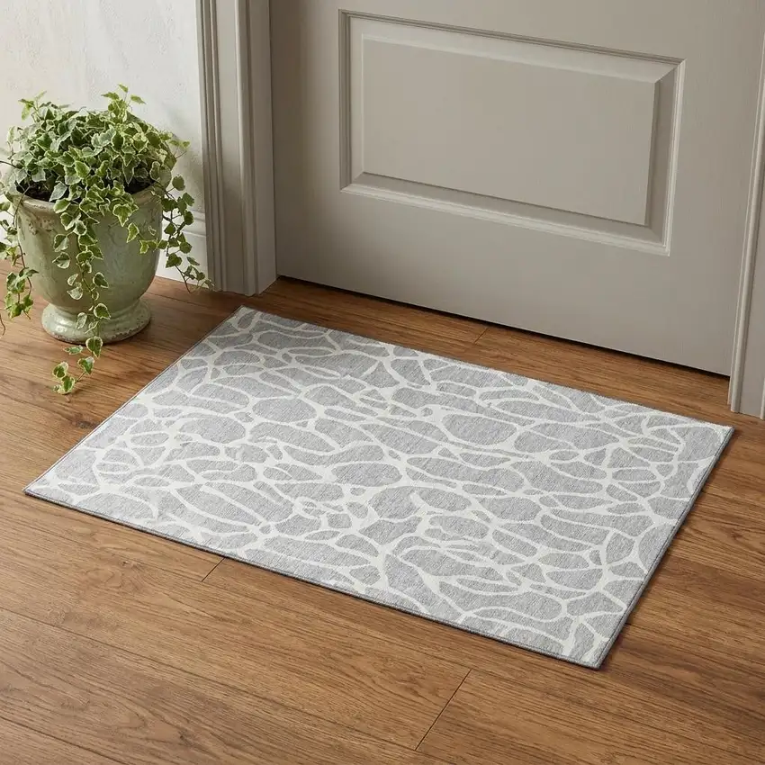 Silver And Ivory Geometric Washable Area Rug With UV Protection Photo 1