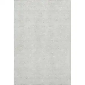 Photo of Silver And Ivory Geometric Washable Area Rug With UV Protection
