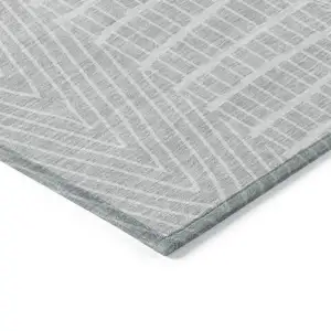 Photo of Silver And Ivory Geometric Washable Indoor Outdoor Area Rug