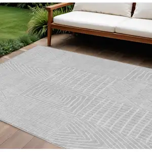 Photo of Silver And Ivory Geometric Washable Indoor Outdoor Area Rug
