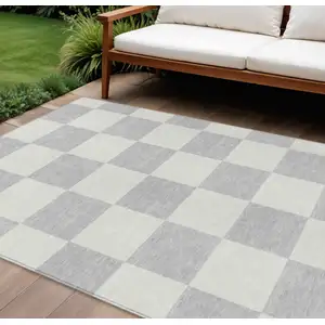 Photo of Silver And Ivory Geometric Washable Indoor Outdoor Area Rug