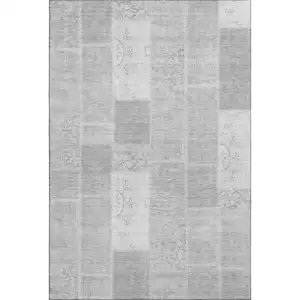 Photo of Silver And Ivory Patchwork Washable Area Rug With UV Protection