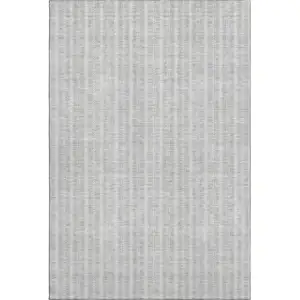 Photo of Silver And Ivory Striped Washable Area Rug With UV Protection