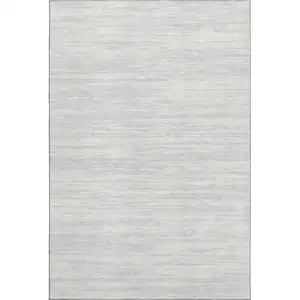 Photo of Silver And Ivory Striped Washable Area Rug With UV Protection