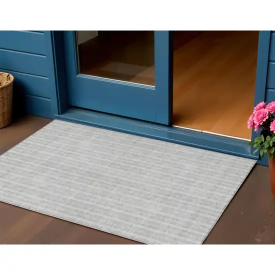 Silver And Ivory Striped Washable Indoor Outdoor Area Rug Photo 1
