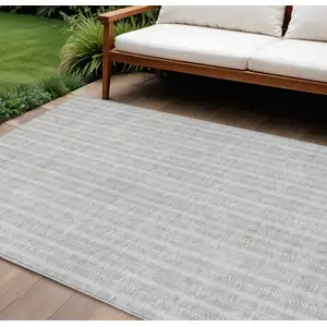 Photo of Silver And Ivory Striped Washable Indoor Outdoor Area Rug