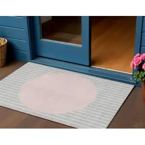 Photo of Silver And Pink Striped Washable Indoor Outdoor Area Rug