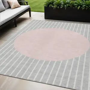 Photo of Silver And Pink Striped Washable Indoor Outdoor Area Rug