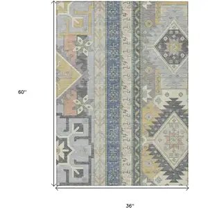 Photo of Silver Beige And Gold Aztec Washable Indoor Outdoor Area Rug