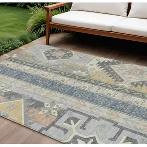 Photo of Silver Beige And Gold Aztec Washable Indoor Outdoor Area Rug