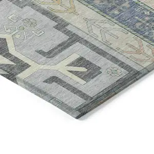 Photo of Silver Beige And Gold Aztec Washable Indoor Outdoor Area Rug