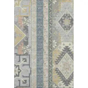 Photo of Silver Beige And Gold Southwestern Washable Area Rug With UV Protection